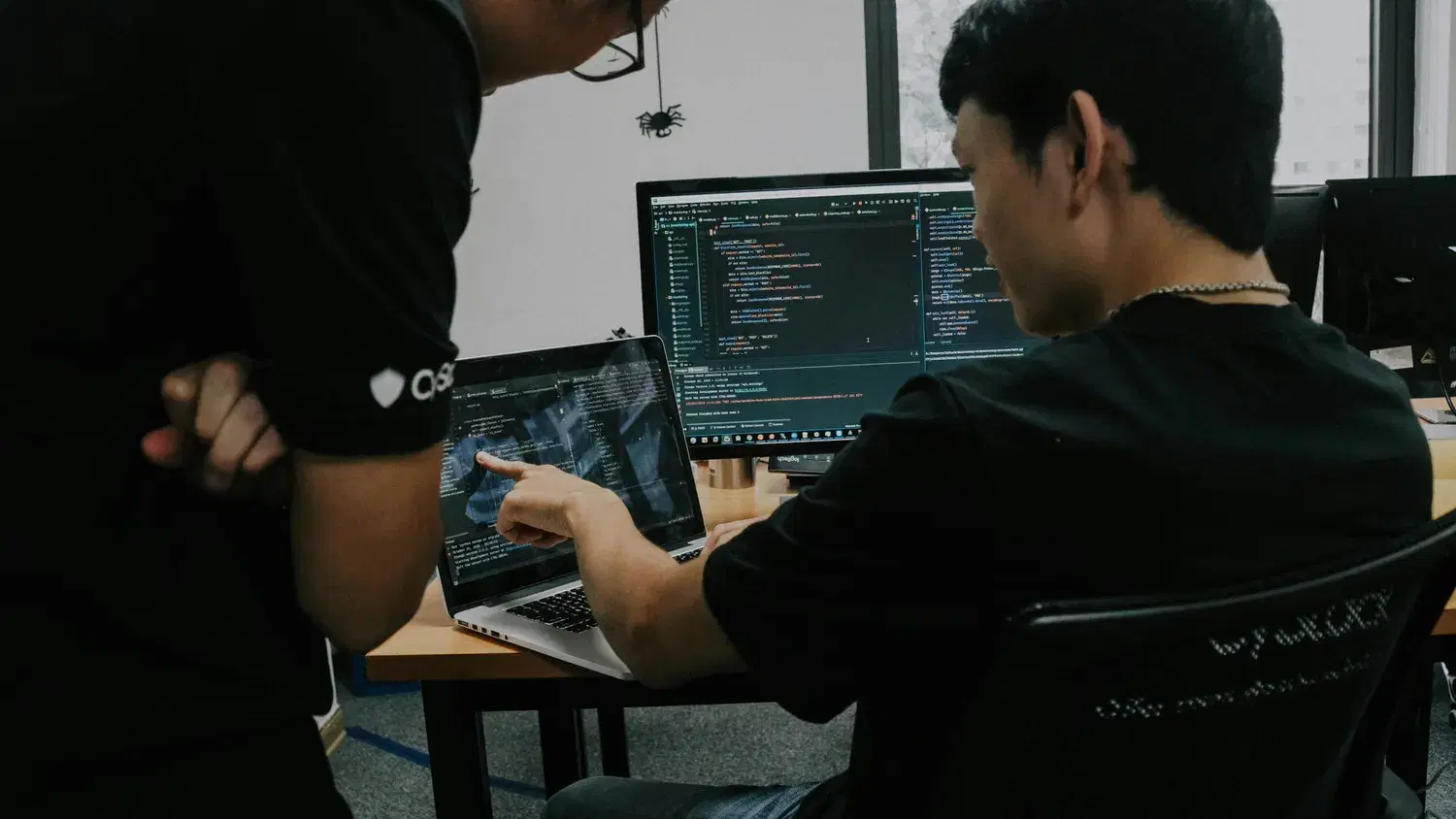 Blinknbuild Systems engineers reviewing code together